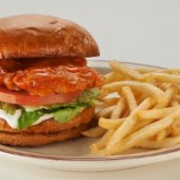Grilled Or Crispy Chicken Breast Sandwich** · Delicately seasoned your choice of grilled or crispy chicken. Comes with lettuce, tomato and...