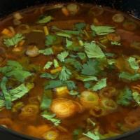 Tom Yum Soup · Penny's signature hot and sour soup.  Shrimp, green onions, cilantro, and straw mushrooms wi...