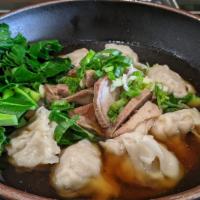 Wonton Soup · Sliced tender Asian style roasted pork, Chinese greens and homemade shrimp and pork dumpling...