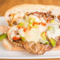 Bulgogi Cheese Steak · Tender marinated ribeye, caramelized onions, red and green peppers, topped with melted provo...