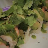 Mexican Roll · Crab, jalapeno, avocado, topped with shrimp avocado, cilantro & jalapeno dressing.