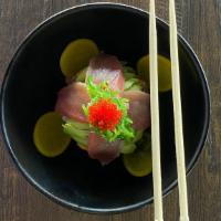 Tuna Bowl · Tuna, seaweed salad, avocado, pickle radish, sesame seed with eel sauce and spicy mayo rice.