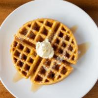 Waffle · Dusted with powdered sugar. Butter and syrup on the side.