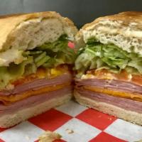Ham & Cheese · Ham, cheddar cheese, lettuce, tomatoes, mustard, and mayo.