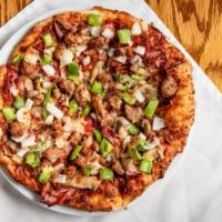 Deluxe · Pepperoni, ham, mushrooms, bacon, Italian sausage, green peppers, and onions.