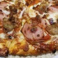 Meat Lover'S · Pepperoni, ham, bacon, Italian sausage, and ground beef.