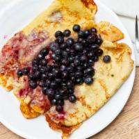 Blueberry Crepes · Filled with fresh glazed blueberries.