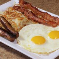Pancake Breakfast* · 2 eggs, 2 bacon strips, 2 sausage links, hash browns, and 2 any style pancakes