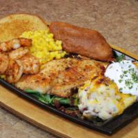 Seafood Dinner · Your choice of grilled or fried tilapia fillet, fried shrimp, and fried fish served on top o...