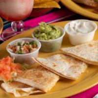 Quesadilla Grande Super · All extras for an additional charge.