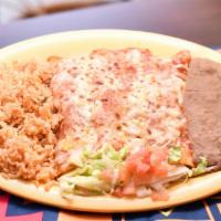 Enchiladas · Three corn tortillas dipped in our special red sauce, then filled with your choice of cheese...