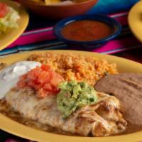 Burrito Supreme · One large flour tortilla filled with beans and stuffed with your choice of ground beef, chun...