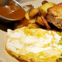 Eggs & Toast · Two farm eggs any style, roasted fingerling potatoes, dressed greens, toast