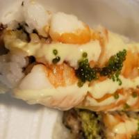 Tiger · Tempura crunch and eel topped with shrimp, wasabi aioli and tobiko.