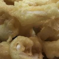 Calamari · Deep-fried tender calamari rings till crisp, and golden brown.