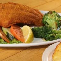 Roscoe'S Catfish · Two fresh catfish fillets breaded and fried to perfection. Served with tartar sauce, one sid...