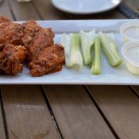 8 Jumbo Chicken Wings · Jumbo wings served with celery and your choice of ranch, bleu cheese.