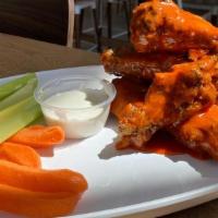 Wings · 8 Jumbo baked wings rubbed with our special seasoning blend and finished in the oven. Comes ...