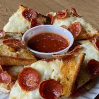 Pizza Bread · Start with our garlic bread and cheese then add pepperoni. Crisp up in the oven and add mari...