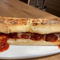 Meatball Sub · Our Housemade Meatballs placed on an Italian sweet Bun smothered in marinara sauce and mozza...