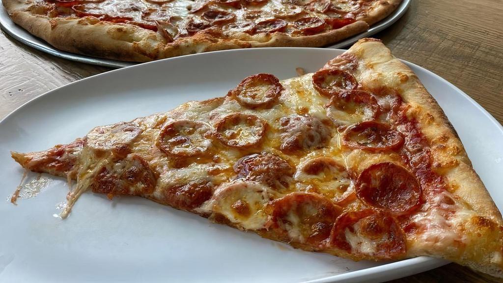 Pepperoni Slice · Specialty blend of locally made Ezzo Pepperoni covered in 100% whole milk Mozzarella Cheese on a thin NY style crust.