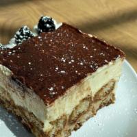 Tiramisu · A classic Italian dessert! Layers of Lady Fingers and Mascarpone Cheese topped with Cocoa Po...