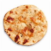 Wheat Naan · Freshly baked in our tandoor ovens, lightly brushed with oil and sprinkled with kosher salt....