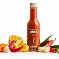 Whoa Hot Sauce Bottle  · It's a gluten-friendly combo of tart and sweet that will put a smile on anyone's face. Heat ...