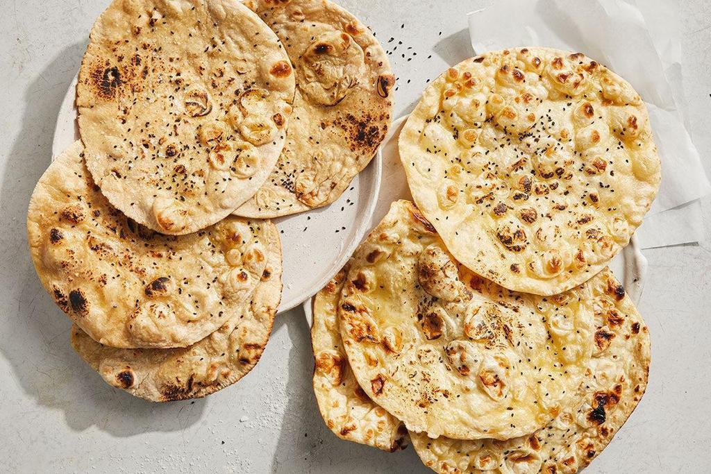 Naan Bread · Try our soft and crispy vegetarian-friendly naan or the flaky vegan wheat naan. Includes 4 fresh tandoor baked naans.
