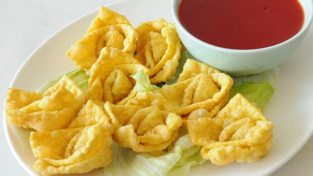 Fried Wonton (8) · Pork and scallions in a wonton wrap, deep fried, and served with Sweet and Sour sauce on the side.