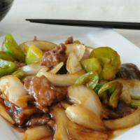 Pepper Steak · Stir fried flank steak, green peppers, and onions in our Chef's Special Brown sauce