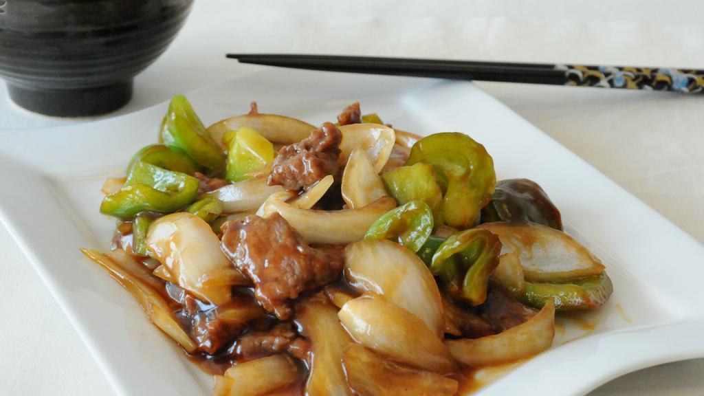 Pepper Steak · Stir-fried flank steak, green peppers and onions in our Chef's Special Brown sauce.