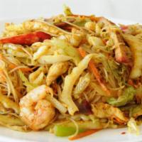 Singapore Mei Fun (Spicy) · Thin rice noodles stir-fried with napa, celery, carrots, scallions, spicy curry sauce and yo...