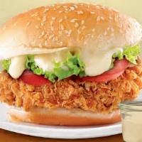 Fried Chicken Burger · Our spin on a traditional fried chicken sandwich consists of deep fried chicken patty along ...