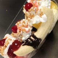 Banana Split · Typically served with Chocolate, Vanilla, and Strawberry Ice Cream with Chocolate Syrup, Str...