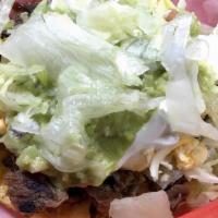 Carne Asada Torta · Comes with: beans, lettuce, tomatoes, cilantro, onions, cheese, sour cream, and guacamole. P...