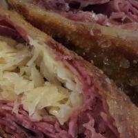 Reuben · Detroit's own Wigley's comed beef pilled on grilled rye bread with sauerkraut Swiss cheese a...