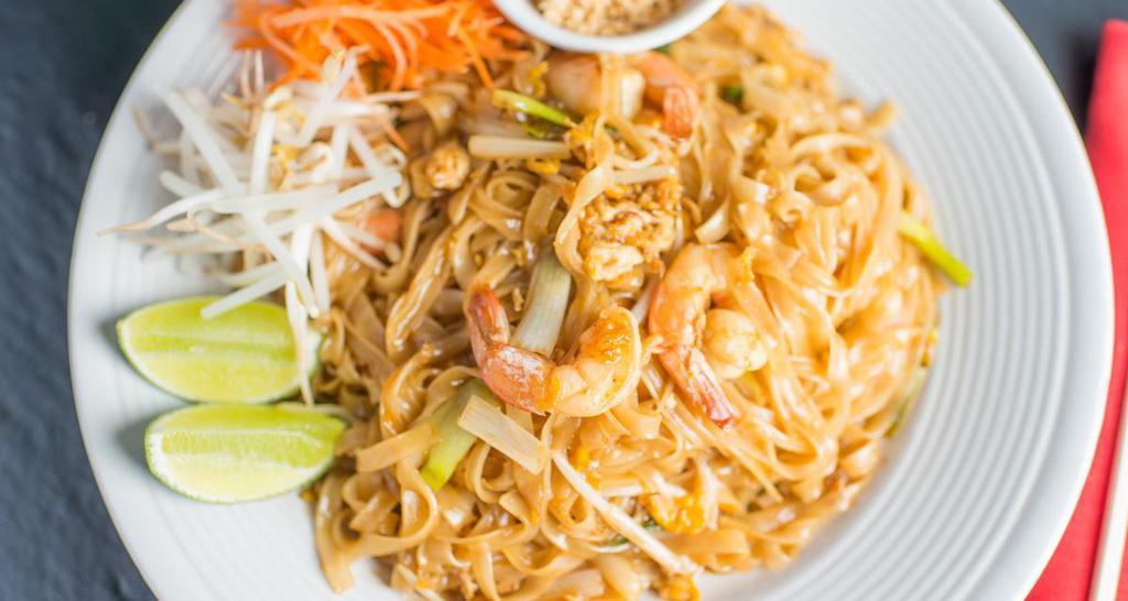 Pad Thai · Sautéed rice noodles with eggs, bean sprouts and green onions, topped with crushed peanuts.