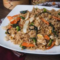Basil Fried Rice · Thai-style fried rice with basil leaves, garlic, green pepper and toasted chili flake