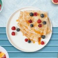 Fruit De Loop Crepe  · Strawberry, cherry, mango, raspberry, syrup, vanilla, and ice cream served over a warm crepe.