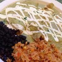 Green Enchiladas  · Gluten-free. Corn tortillas stuffed with garlic mashed potatoes, smothered in a green tomati...
