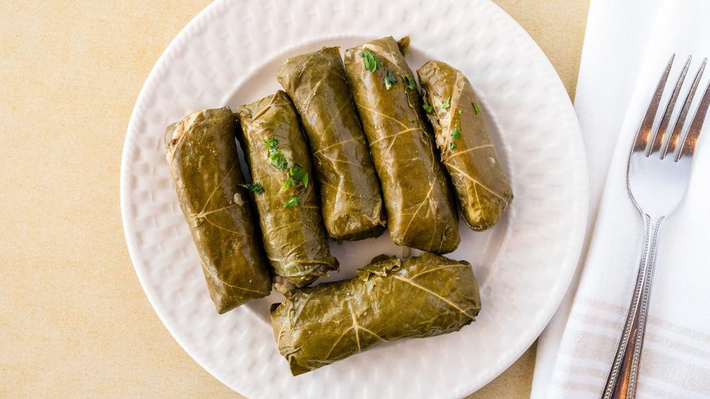 Stuffed Cabbage Roll · Two pieces stuffed with rice and ground beef mixed with mediterranean spices.