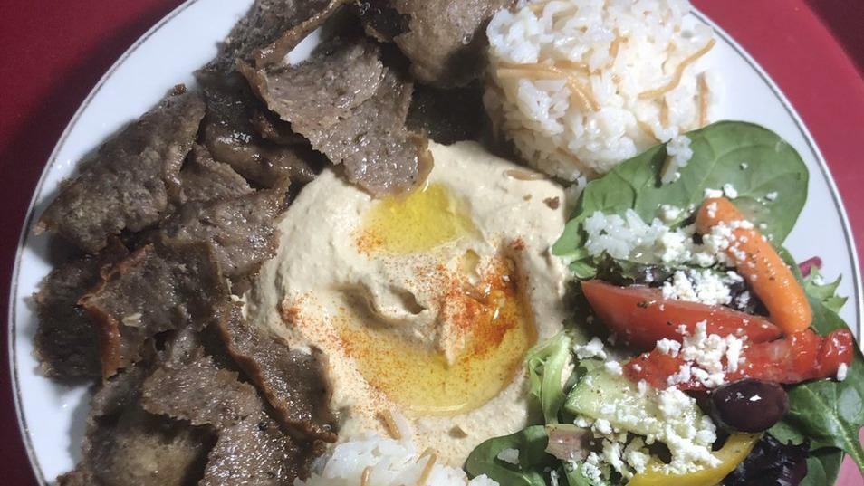 Gyro Plate · Generous portion of gyro meat served with pita bread and cucumber sauce.
