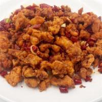 401 Dried Chili Chicken 辣子鸡 · Diced chicken wok-fried to a crisp with blackened chilies, roasted garlic, scallions, Sichua...