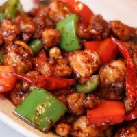404 Kung Pao Chicken 宫保鸡丁 · Wok seared with blackened chilies, red & green bell peppers, mushrooms, and toasted peanuts ...