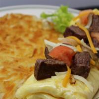 Steak Supreme Omelette · Sirloin steak mushrooms, onions, hash browns, pepper Jack cheese, topped with tomatoes. Serv...