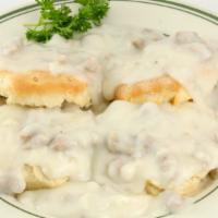 Biscuits N' Gravy (Full Order) · 2 freshly baked biscuits, split and smothered with our creamy country sausage gravy.