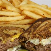 Patty Melt Combo Our Most Popular Melt! · Our 1/3 lb. burger topped with sautéed onions, American and Swiss cheese.
