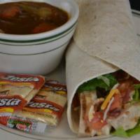 Chicken Bacon Ranch · Grilled chicken, bacon, lettuce, cheese, diced tomatoes, and ranch dressing. Rolled in flour...