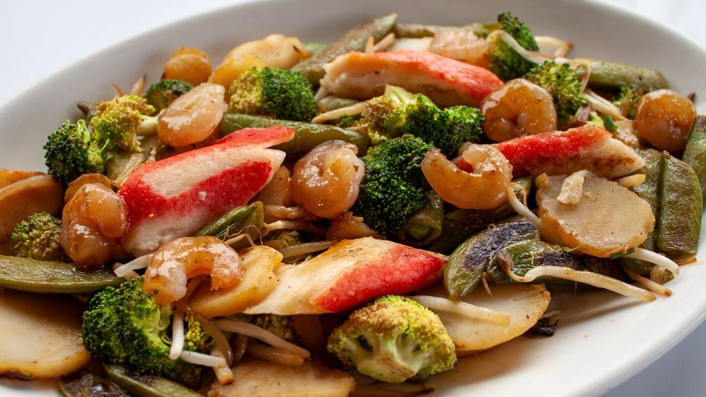 Asian Seafood Bowl · Most Popular. Shrimp, scallops, krab, bean sprouts, broccoli, pea pods, tomatoes, garlic and water chestnuts. Served with teriyaki sauce, lemon sauce, lemon pepper and bd's seasoning.